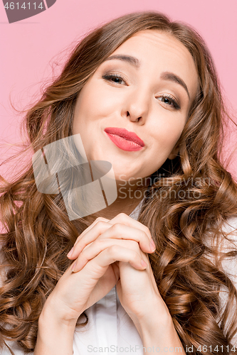 Image of Indoor shot of regretful woman looks gloomy and desperate