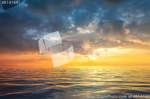 Image of a golden sunset at the ocean