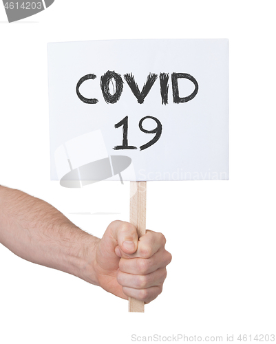 Image of Sign in a hand, isolated on white