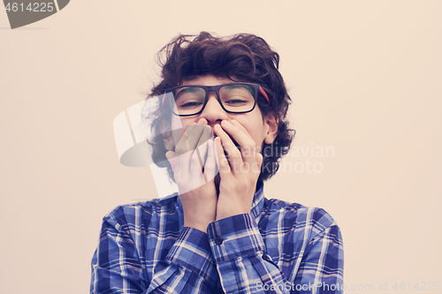 Image of portrait  of smart looking arab teenager with glasses