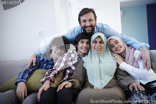 Image of muslim family portrait  at home