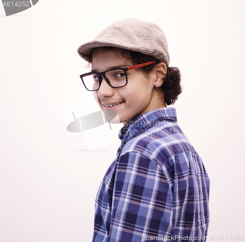 Image of portrait  of smart looking arab teenager with glasses