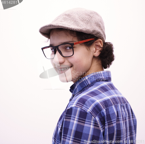 Image of portrait  of smart looking arab teenager with glasses