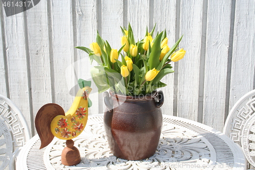 Image of Easter picture with yellow Tulips and Easter cock