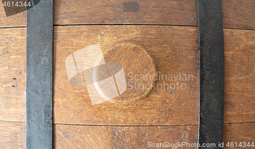 Image of Close-up of an old water barrel, used on an old Frisian boat