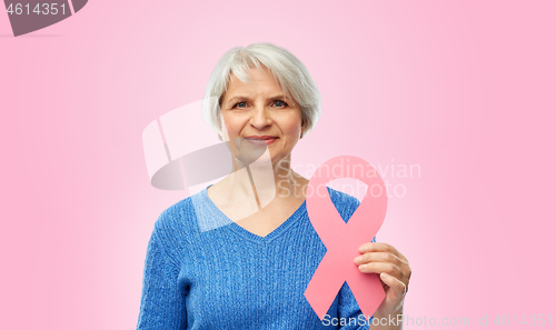 Image of old woman with pink breast cancer awareness ribbon