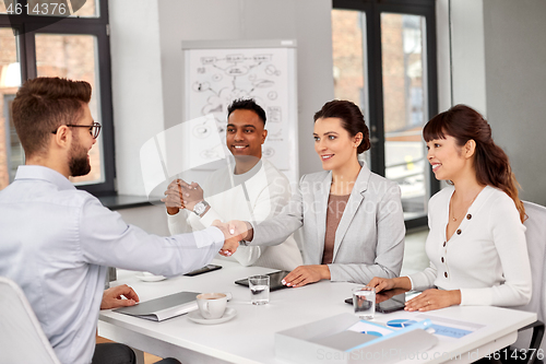 Image of recruiters having interview with employee