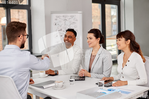 Image of recruiters having interview with employee