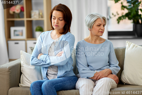 Image of disagreement between senior mother adult daughter