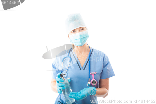 Image of Nurse or doctor holding hand sanitizer