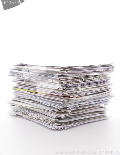 Image of Large pile of waste paper isolated on white