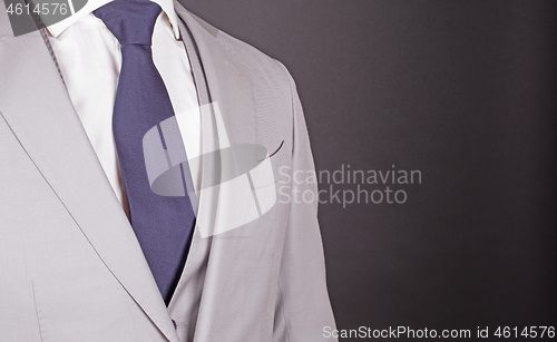 Image of Man in a grey suit, close-up