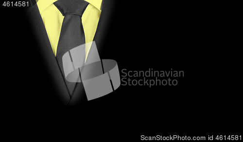 Image of Man in a black suit, close-up