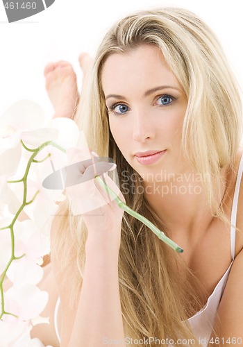 Image of blonde in cotton underwear with orchid
