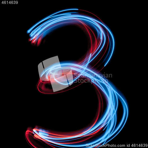 Image of The neon number 3, blue light image