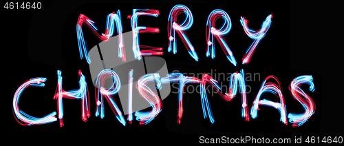 Image of Christmas neon light sign in the night