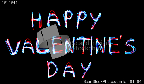 Image of Glowing inscription happy Valentines day on a black background