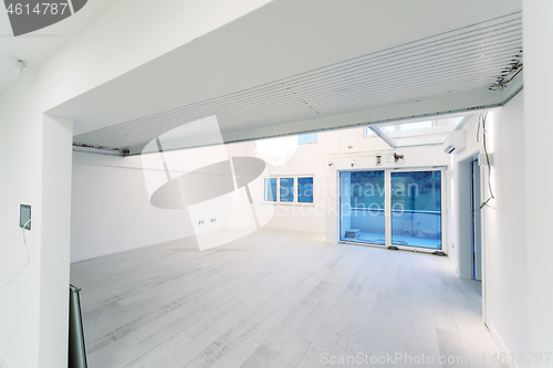 Image of Interior of empty stylish modern open space two level apartment