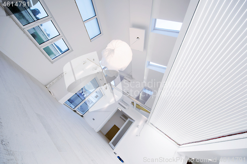 Image of Interior of empty stylish modern open space two level apartment