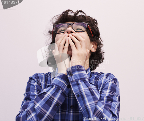 Image of portrait  of smart looking arab teenager with glasses