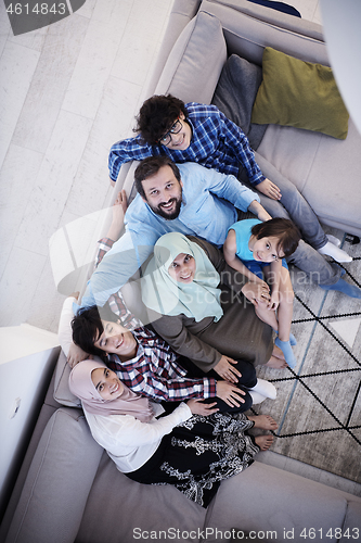 Image of muslim family portrait  at home top view