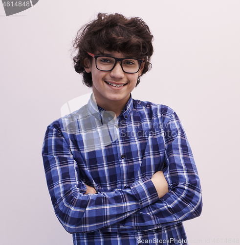 Image of portrait  of smart looking arab teenager with glasses