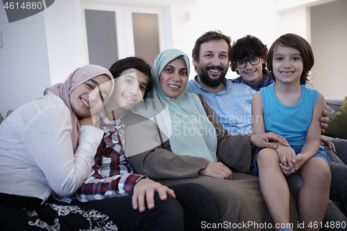 Image of muslim family portrait  at home