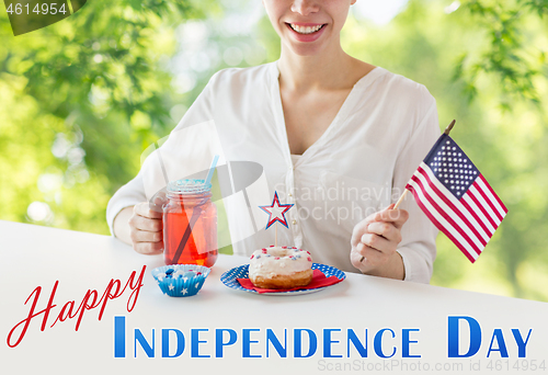 Image of happy woman celebrating american independence day