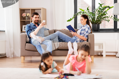 Image of happy family spending free time at home