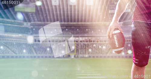 Image of closeup American Football Player isolated on big modern stadium