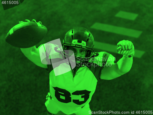 Image of duo toned american football player in  arena at night