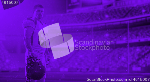 Image of duo toned american football player in  arena at night