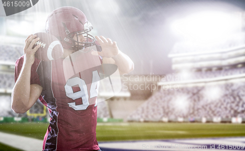 Image of american football player throwing ball