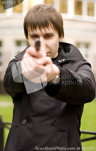 Image of man with gun