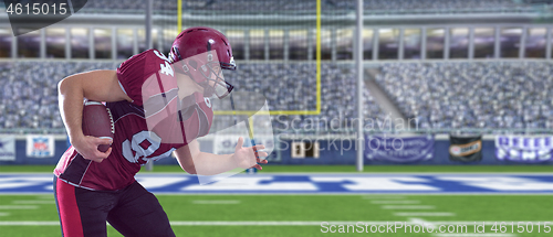 Image of American football Player running with the ball