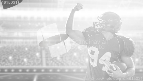 Image of american football player celebrating touchdown