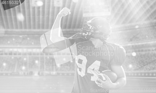 Image of american football player celebrating touchdown