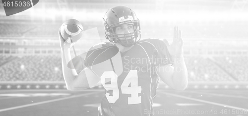 Image of american football player throwing ball