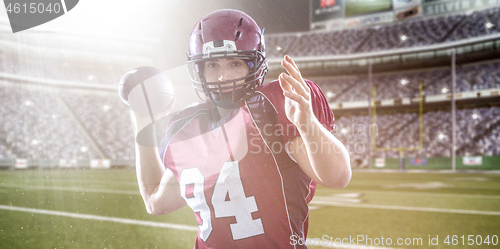 Image of american football player throwing ball