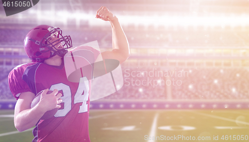 Image of american football player celebrating touchdown