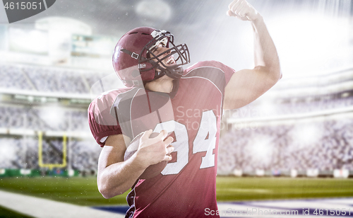 Image of american football player celebrating touchdown