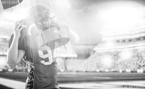 Image of american football player throwing ball