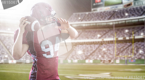 Image of american football player throwing ball