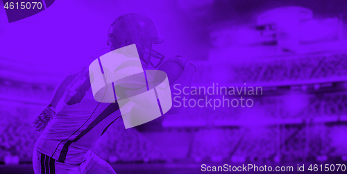 Image of duo toned american football player in  arena at night