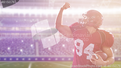 Image of american football player celebrating touchdown