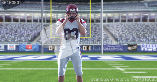 Image of American Football Player isolated on big modern stadium field