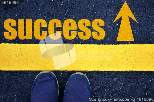 Image of Success word with yellow print