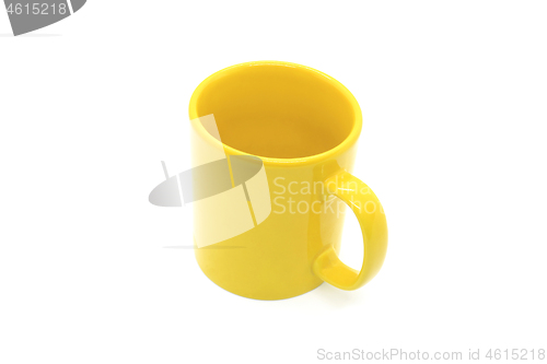 Image of Bright yellow ceramic cup with handle