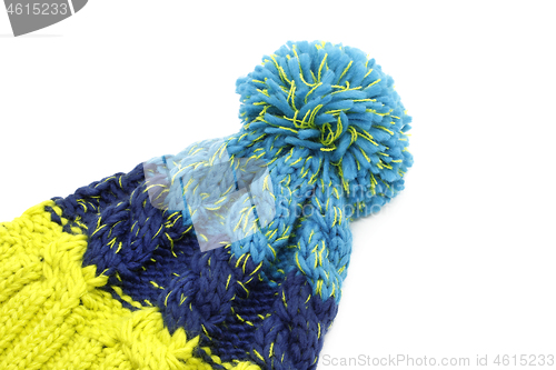 Image of Bright knitted hat isolated with pompon