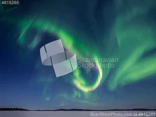 Image of Green and Pink Aurora Borealis over Lake Inari